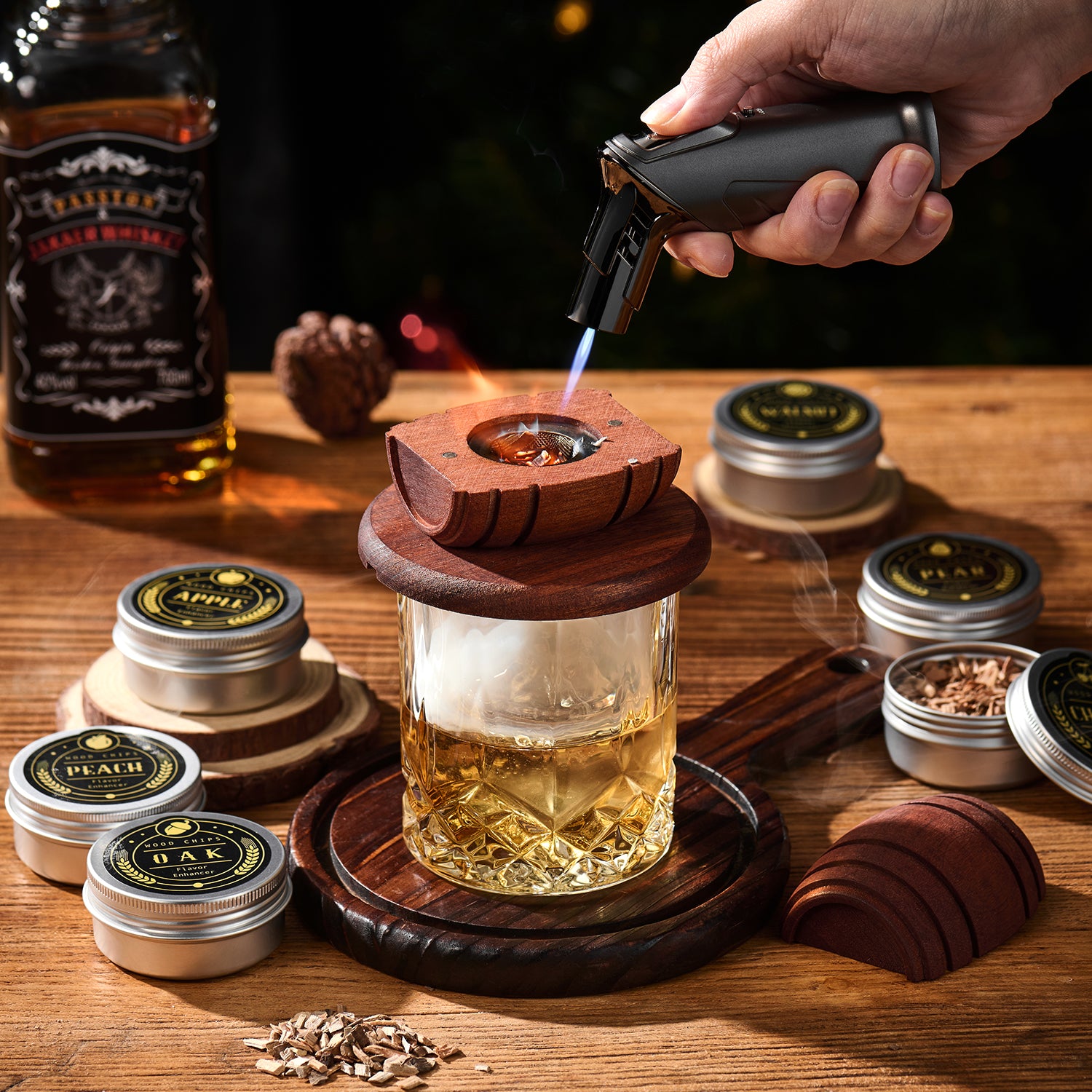 COMBOJOY barrel smoker with a torch, whiskey glass and wood chip tins